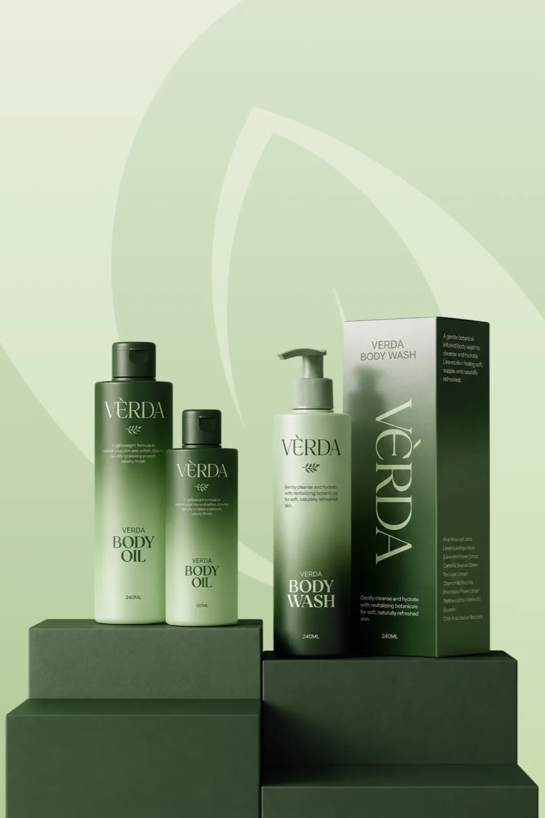 Verda Body Oil and Body Wash bottles staged on green pedestals
